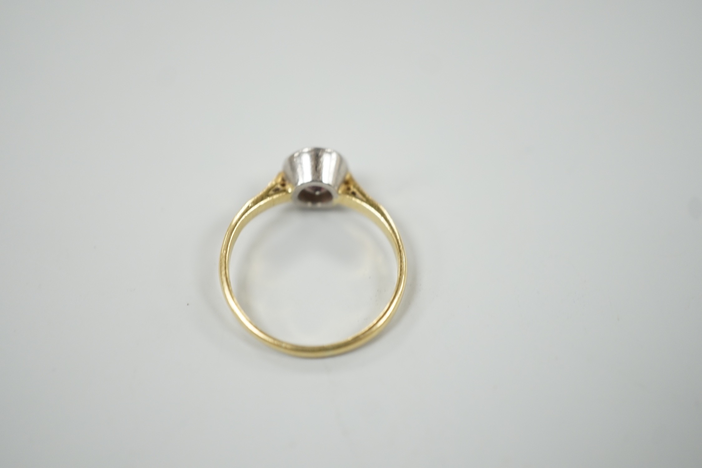 A modern 18ct gold and collet set solitaire diamond ring, size N, gross weight 3.1 grams, the stone diameter approx. 6.1mm